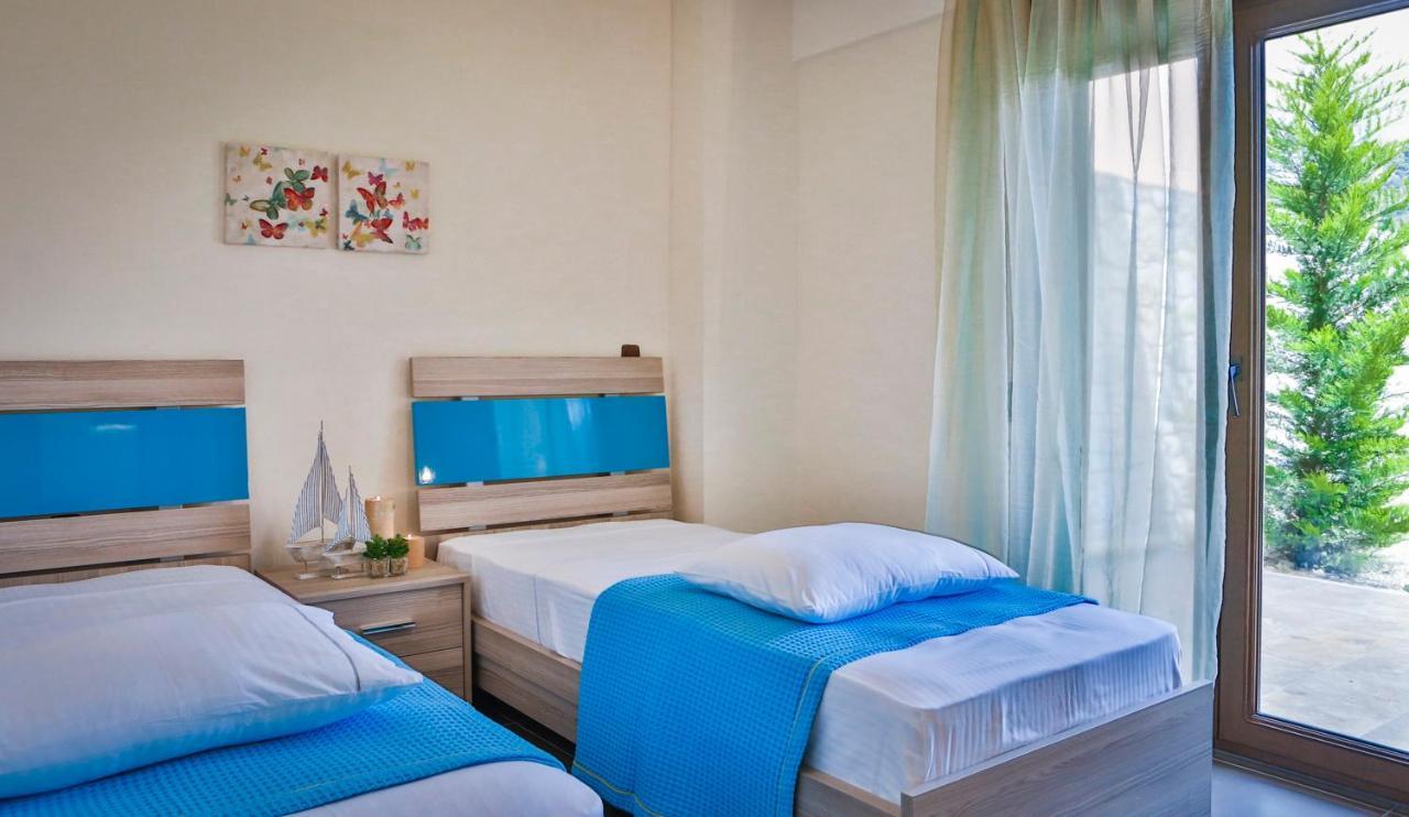 Stigmes Villas & Suites เนอา สกีโอนี ภายนอก รูปภาพ